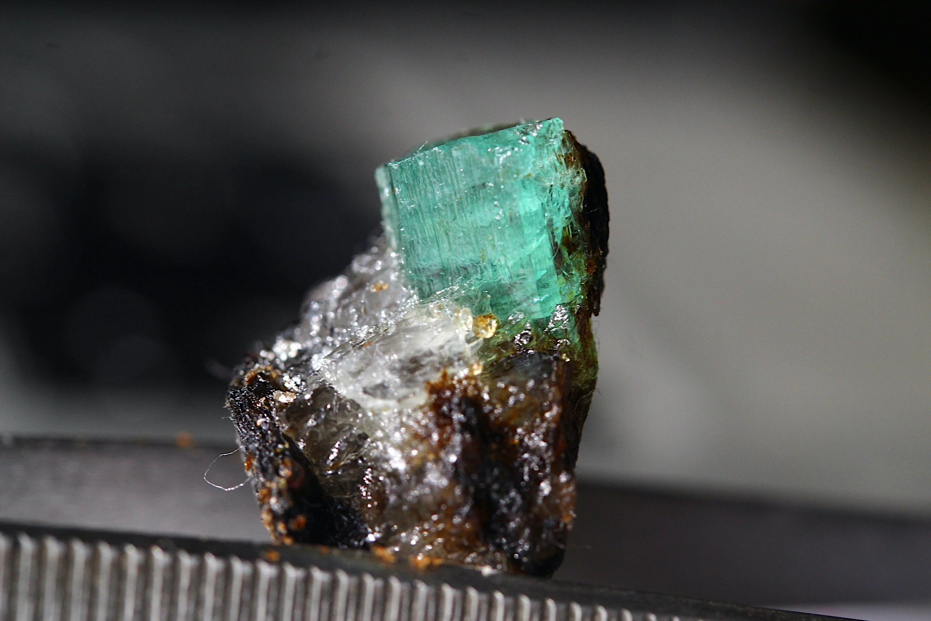 32 Carats Emerald from Chitral in Quartz-Bearing Schist Matrix 32 Carats Emerald from Chitral in Quartz-Bearing Schist Matrix